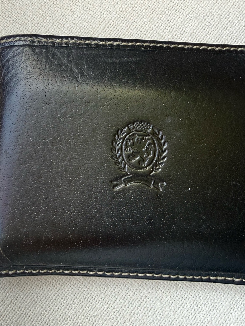 Tommy Hilfiger Black Leather Bi Fold Wallet with Embossed Crest